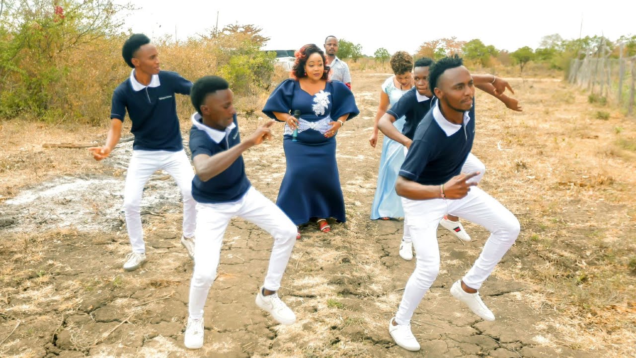 CAROLINE & ROMANUS HOUSE WARMING BY REDEMPTER  MUTINDA (Official Video)