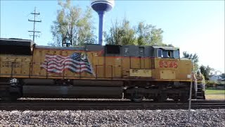 UP engine 8346 leads a westbound autorack train in Dixon IL