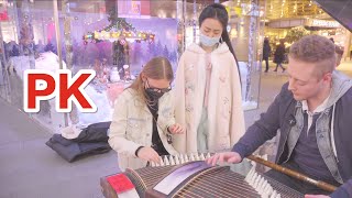 國外街頭外國人弹古箏捲起來了|Young man ask to play the instrument... Shocked by how talented he is