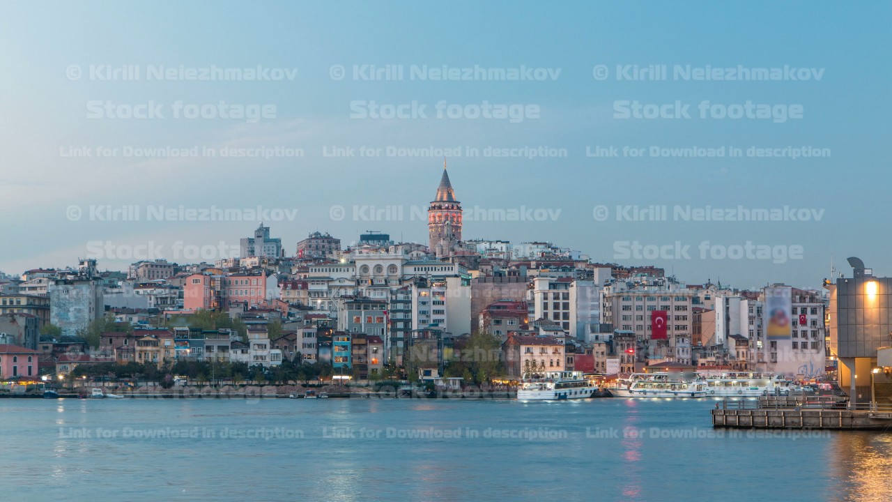 View over golden horn bay on the galata tower and its neighborhood day to night timelapse in