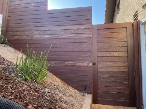 HORIZONTAL modern fence (on a slope)