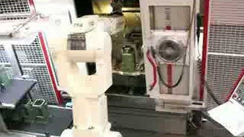 RFA Kawasaki Robotloader with RFA-Vision loading Hermele milling machine