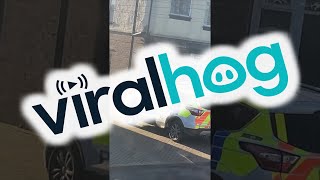Police Break Down Door as Suspect Jumps Out Window || ViralHog
