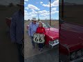Classic Cars at the Seligman Route 66 Centennial Road Shield