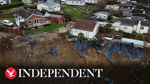 Drone footage shows homes at risk on cliff edge
