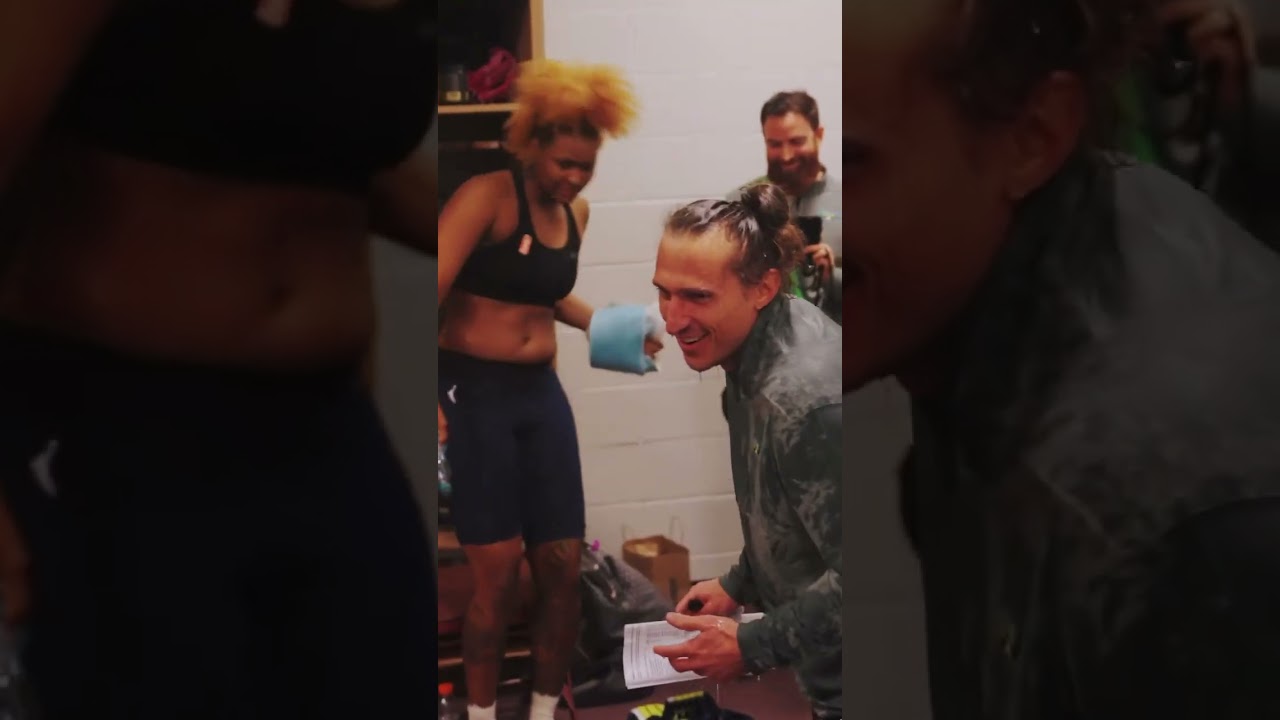 Chris Koclanes gets drenched in the locker room