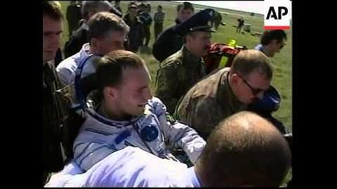 Soyuz capsule carrying space tourist lands