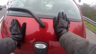 Helping a stranded car in the middle of the road