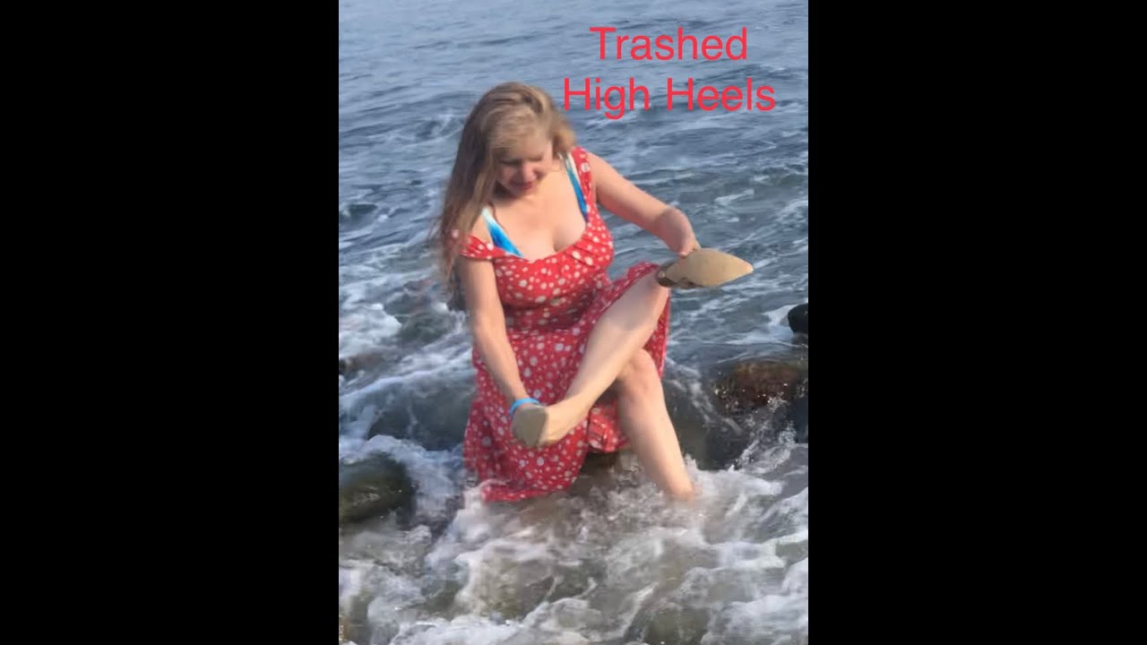 windy day at beach trashing my high heels!