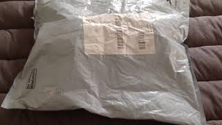 My silicone doll kit is here from wish.com   Opening.
