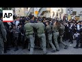 Ultraorthodox jewish men protest in jerusalem over potential law ending military exemption