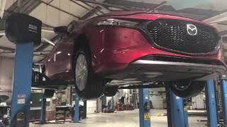New Mazda 3 have a look in-depth at the underside of a Mazda 3 and the Lithium Battery