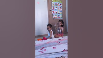 Fisher-Price stack and roll cups (baby rouv and sister miles)