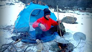 Solo Camping In Stones During Winter Snow