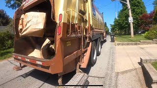 Fast Garbage man POV yard waste collection