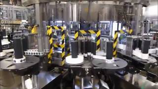 Makro Labeller applying Self Adhesive Labels to Lanson Champagne Bottles