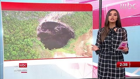 حفرة عميقة جنوبي الصين تضم 19 كهفا وأشجار طولها 50 مترا