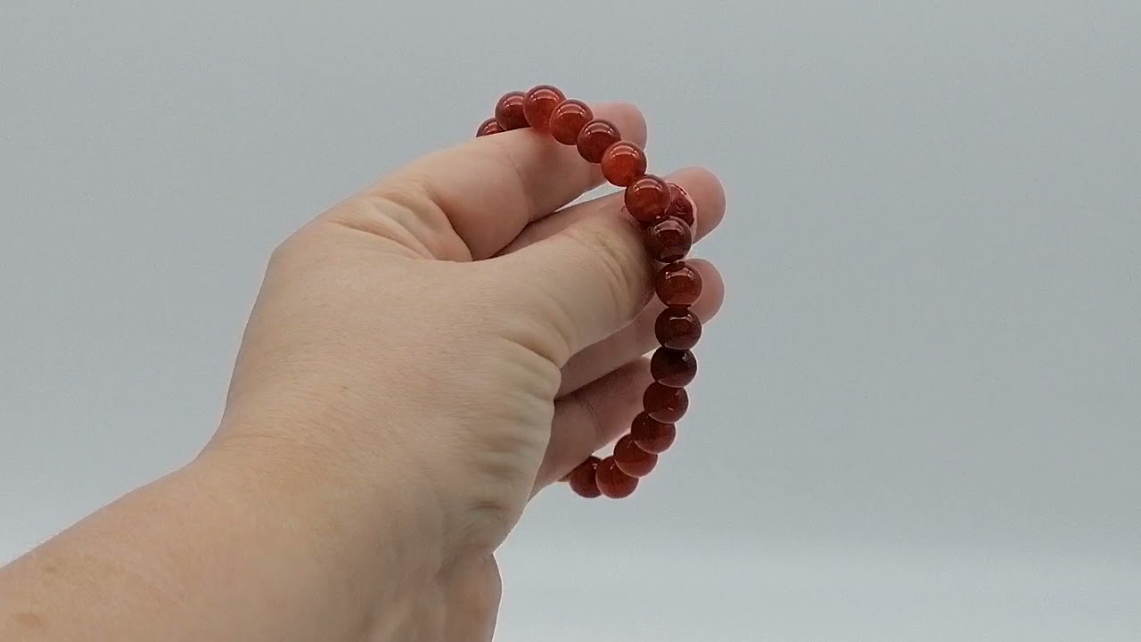 Le bracelet en pierres roulées de jaspe rouge