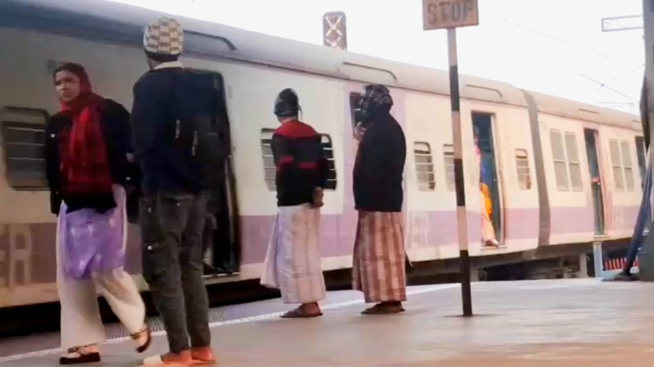 | Local Train Crossing Tollygunge Station |