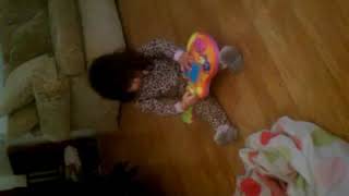 Alysanna Playing Backyardigans Toy Guitar Of Sort Of Rocking Might.