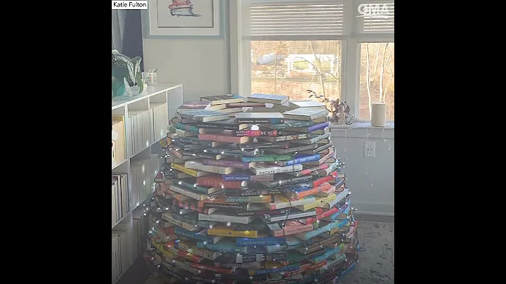 This Christmas tree is built out of books and it s...