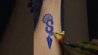 ✨ A single letter, a thousand emotions. Custom "S" tattoo design that tells a unique story. 💙🔥