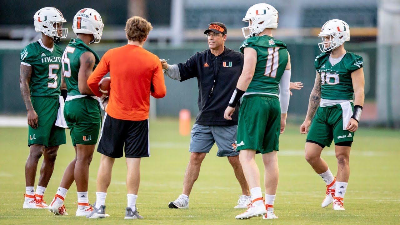 University of Miami football coordinator Dan Enos speaks about quarterbacks