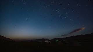 Night timelapse. From moon sunset to the sunrise. Kyrgystan river Bolgart