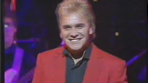 Kevin McMillan playing keyboard with Freddie Starr...