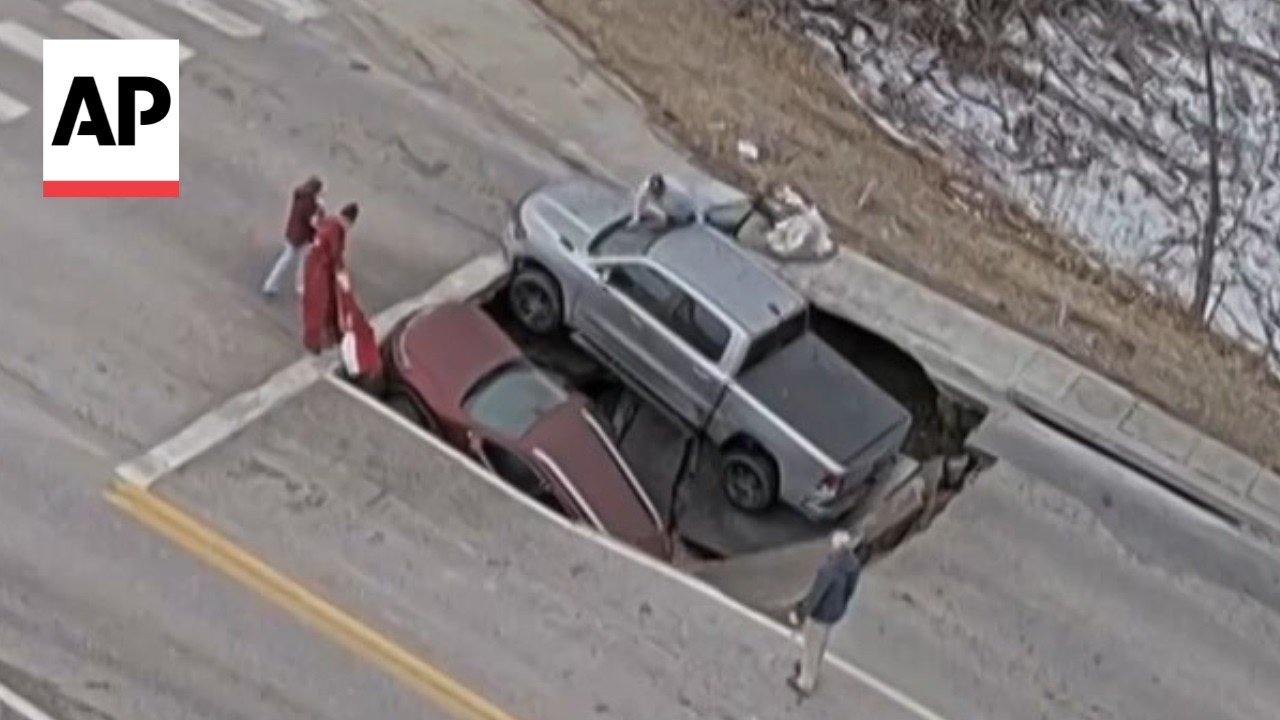WATCH: Sinkhole swallows two cars in Nebraska