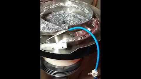 Zipper machine, zipper slider machine, zipper automata, die casting automata