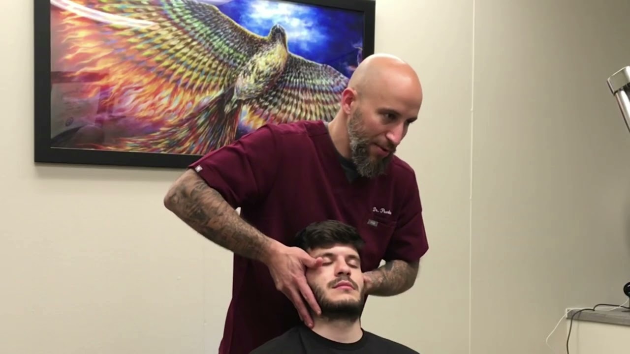 College Student with headaches from neck tension gets a satisfying adjustment-Dallas Chiropractor