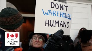 Hundreds gather to protest planned ICE facility in Virginia