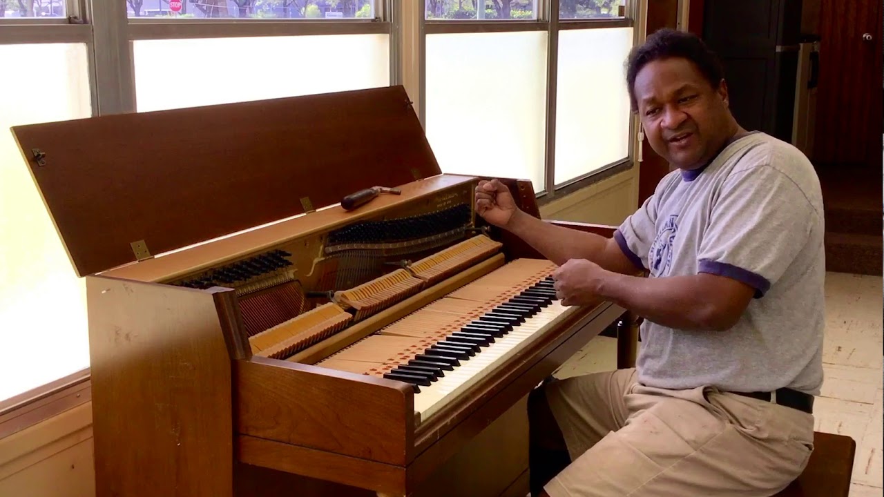 Kris Nicholson test drives a Wurlitzer Model 2111 spinet piano after tuning