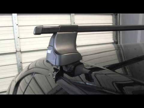 Subaru Legacy Sedan Thule Traverse SQUARE BAR Roof Rack by Rack Outfitters