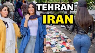 IRAN  TEHRAN Walking in the center of Tehran Enghelab street