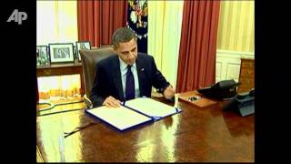 Raw Video: Obama Signs Payroll Tax Cut Extension