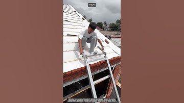 Lifting roof tiles on construction site with efficiency using working tool roof tile conveyor