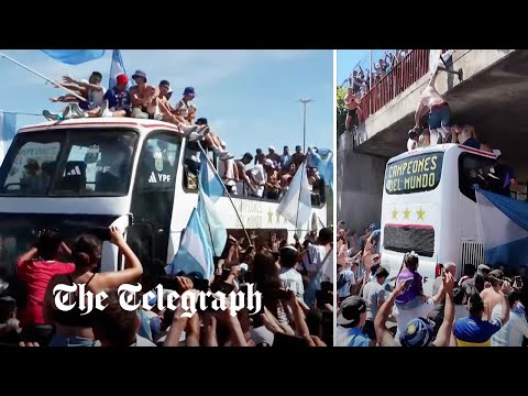 Argentina fan jumps on team's victory parade bus as celebrations turn into chaos