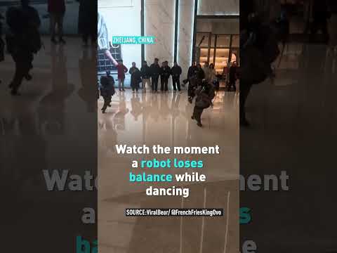 Watch the moment a robot loses balance while dancing