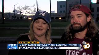 Armed robber pretends to sell basketball tickets