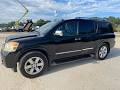 2014 Nissan Armada Platinum 4DR SUV   144,490 Miles