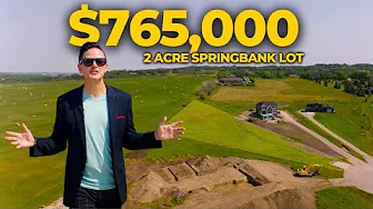 Build Your Dream Home on a 2-Acre Lot in Springbank with Mountain Views!