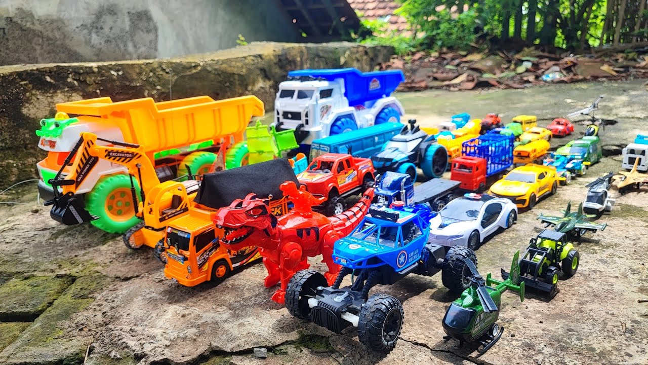 Menemukan Mobil-mobilan Dump Truck, Dinosaurus, Truk Sampah, Truk Kontainer, Truk Molen, Truk Oleng