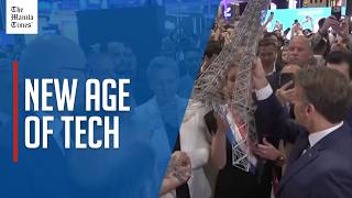 Robots and a model Eiffel Tower: Macron and Modi visit Paris tech conference