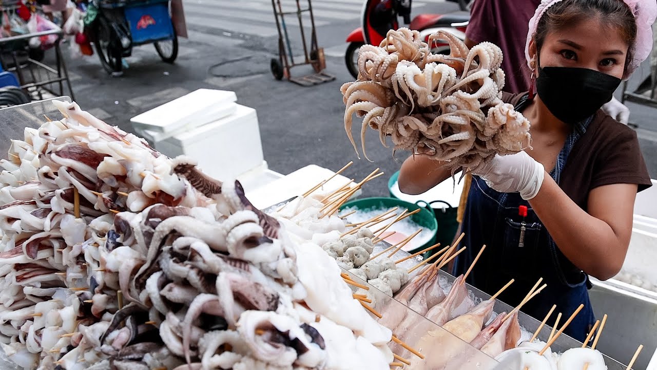 Grilled Whole Squid Skewers in Chinatown Bangkok - Thai Street Food