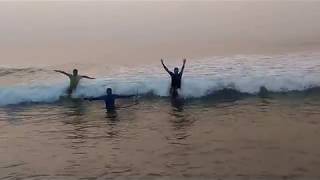 Enjoying bathing moment of puri sea beach at morning