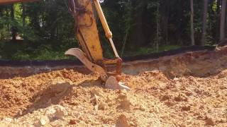 Loading a Rock Truck with a 322 CAT