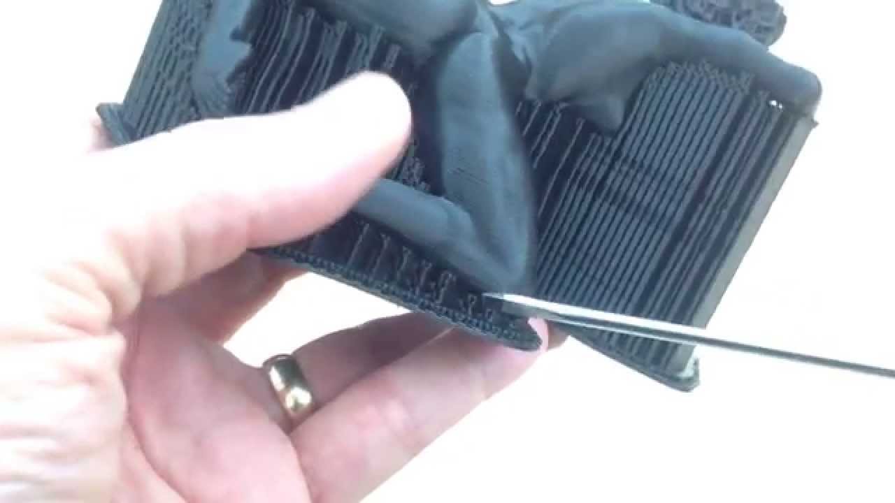 Removing support material from Contact a 3D print by
