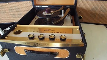 SYMPHONIC stereo record player playing a stack of 45 RPM 7" records